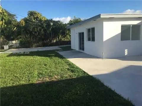 a view of backyard with outdoor space