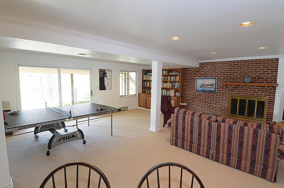 219 Marvin Ridge Road New Canaan, CT 06840 - Photo 23 of 27 a view of a livingroom with furniture and windows