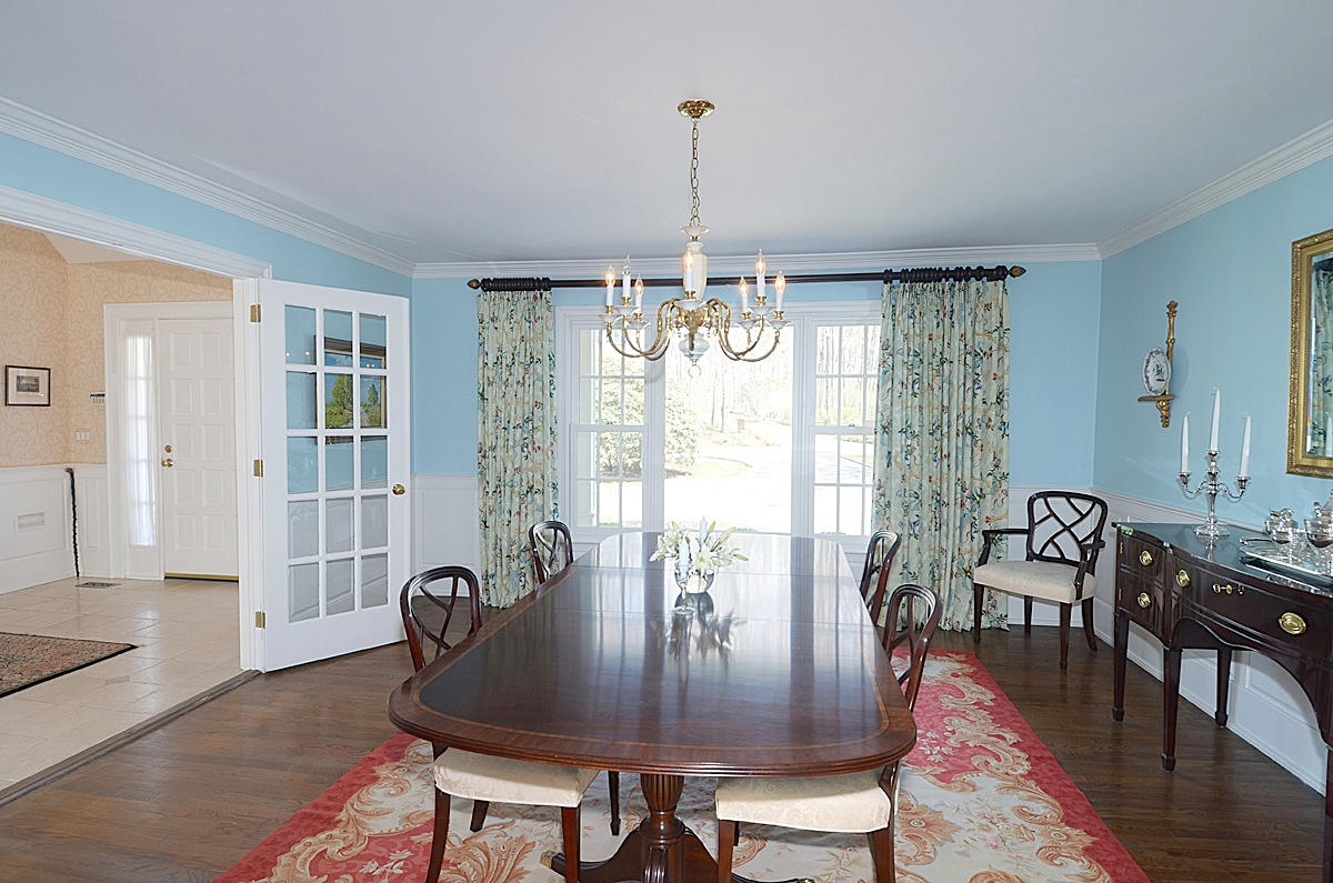 219 Marvin Ridge Road New Canaan, CT 06840 - Photo 7 of 27 a view of a a dining room with furniture window and wooden floor