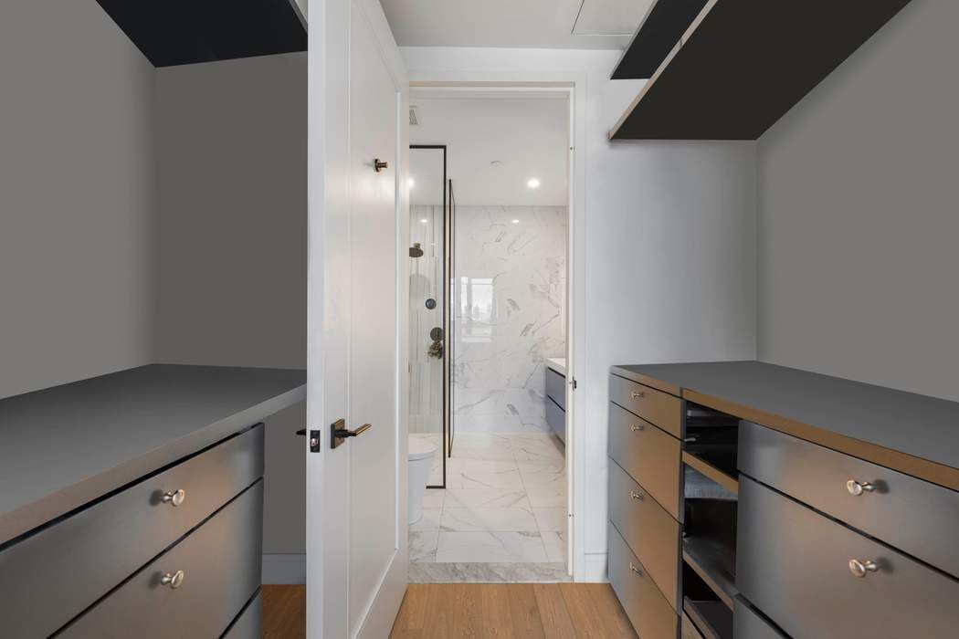 22-43 Jackson Avenue, Unit 11F Queens, NY 11101 - Photo 6 of 18 a bathroom with a granite countertop sink