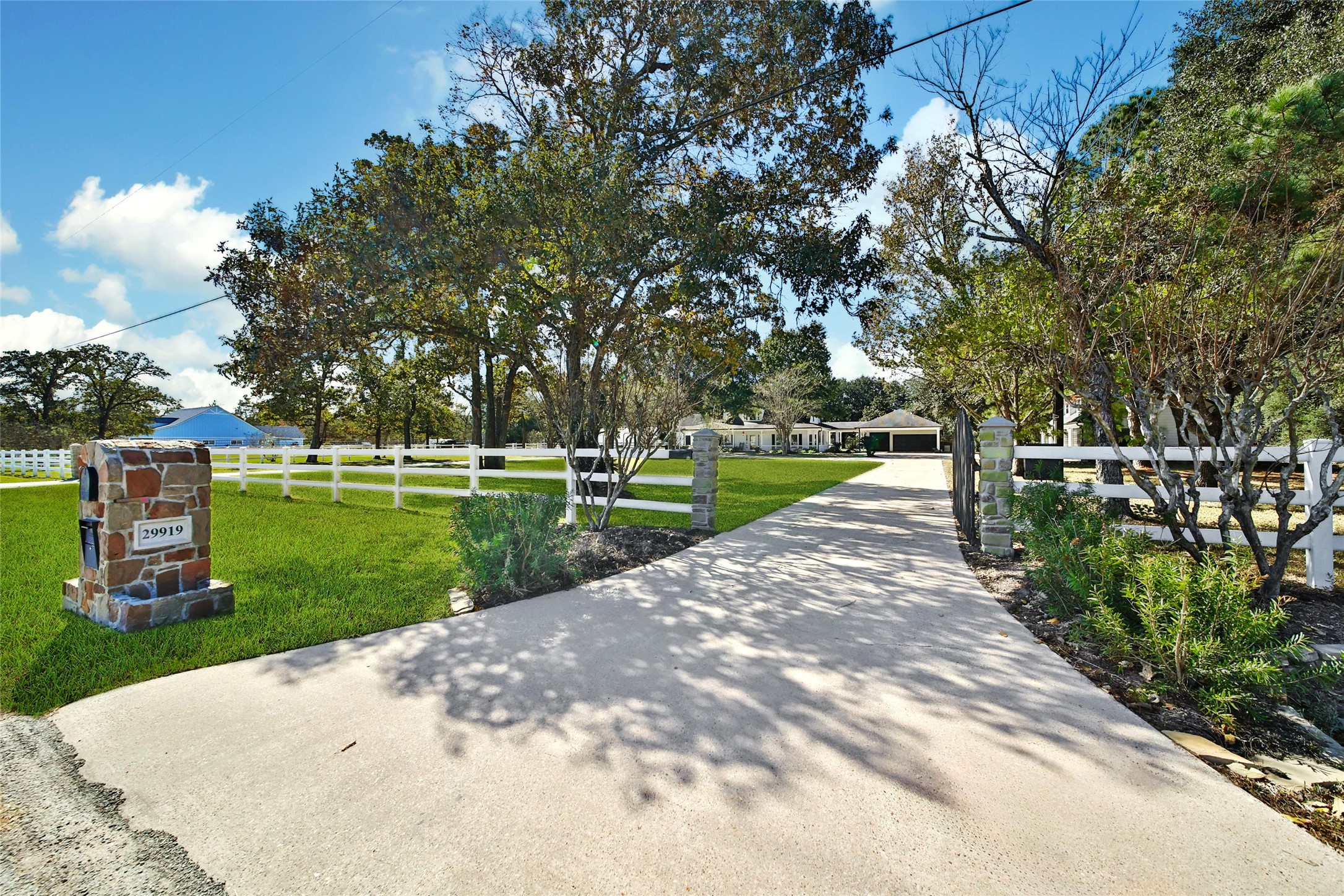 29919 Tudor Way Magnolia, TX 77355 - Photo 3 of 50 Property includes a gated entry with multiple driveways.