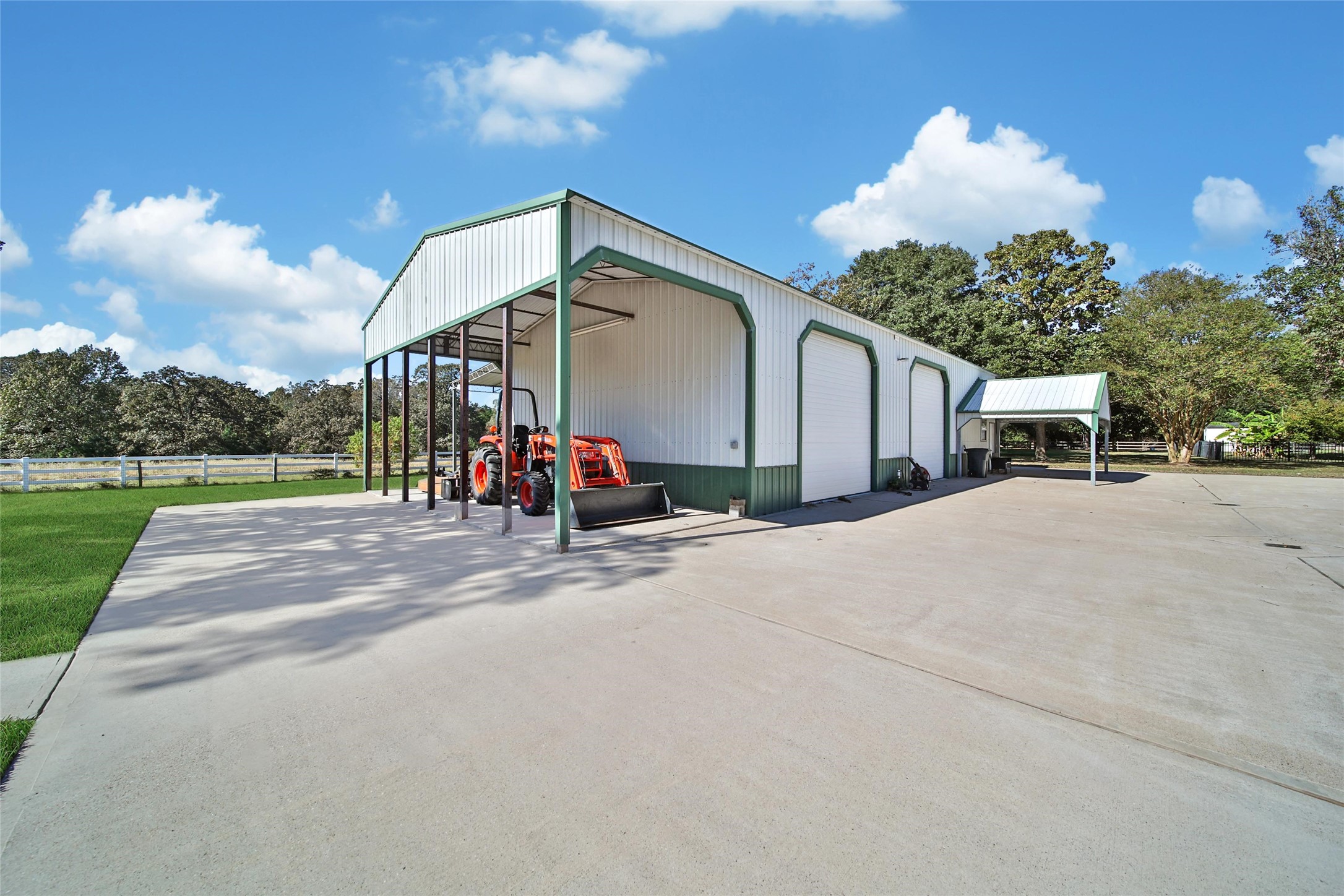 29919 Tudor Way Magnolia, TX 77355 - Photo 47 of 50 30x60 metal shop with RV/Tractor cover attached.