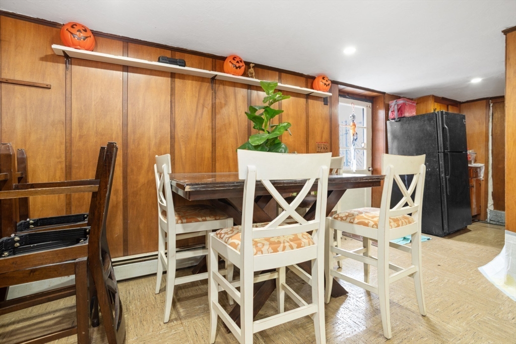 47 School Street Saugus, MA 01906 - Photo 26 of 30 a roof deck with table and chairs