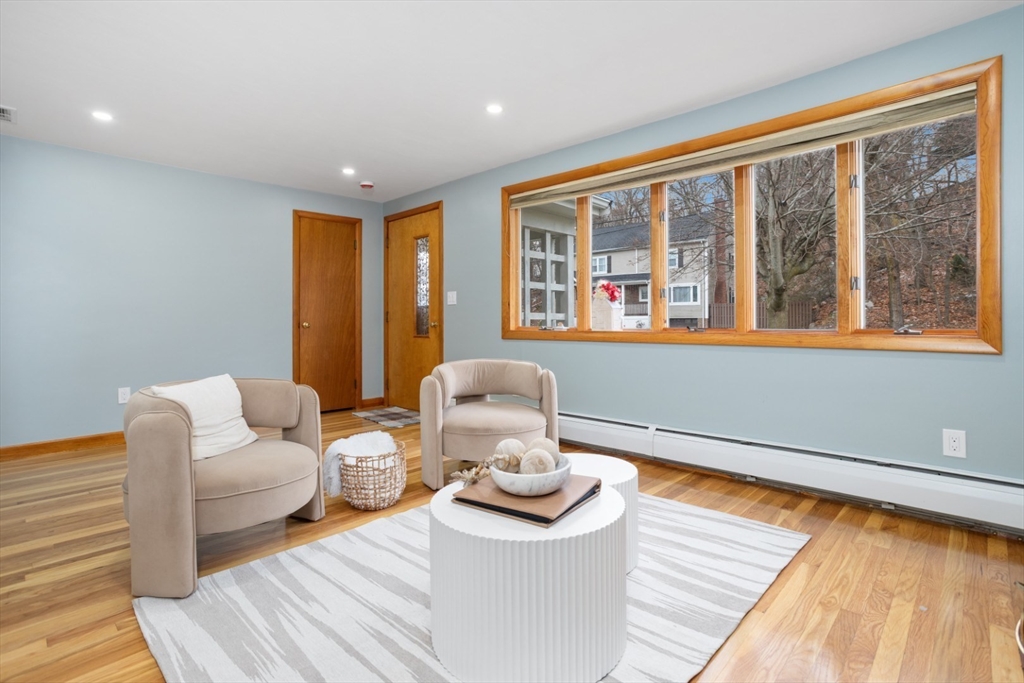 47 School Street Saugus, MA 01906 - Photo 6 of 30 a living room with furniture and floor to ceiling windows