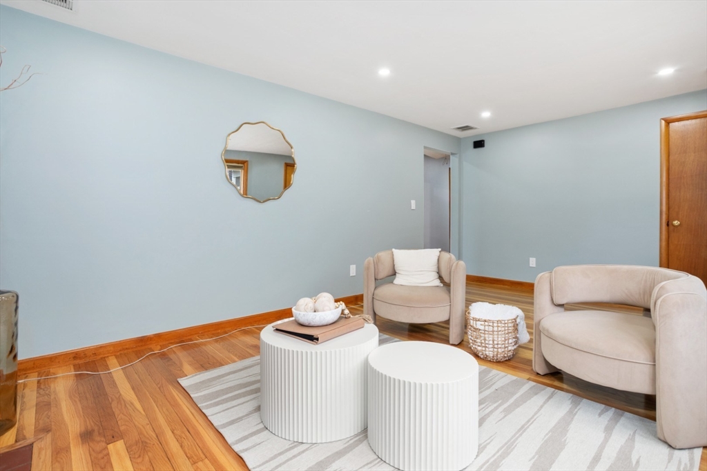 47 School Street Saugus, MA 01906 - Photo 7 of 30 a living room with furniture and a wooden floor