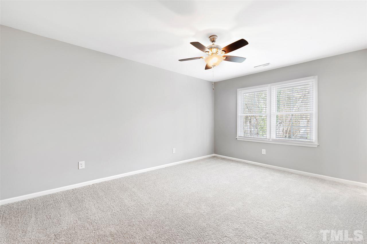 7605 Starling Court Raleigh, NC 27615 - Photo 18 of 30 a view of an empty room with a window