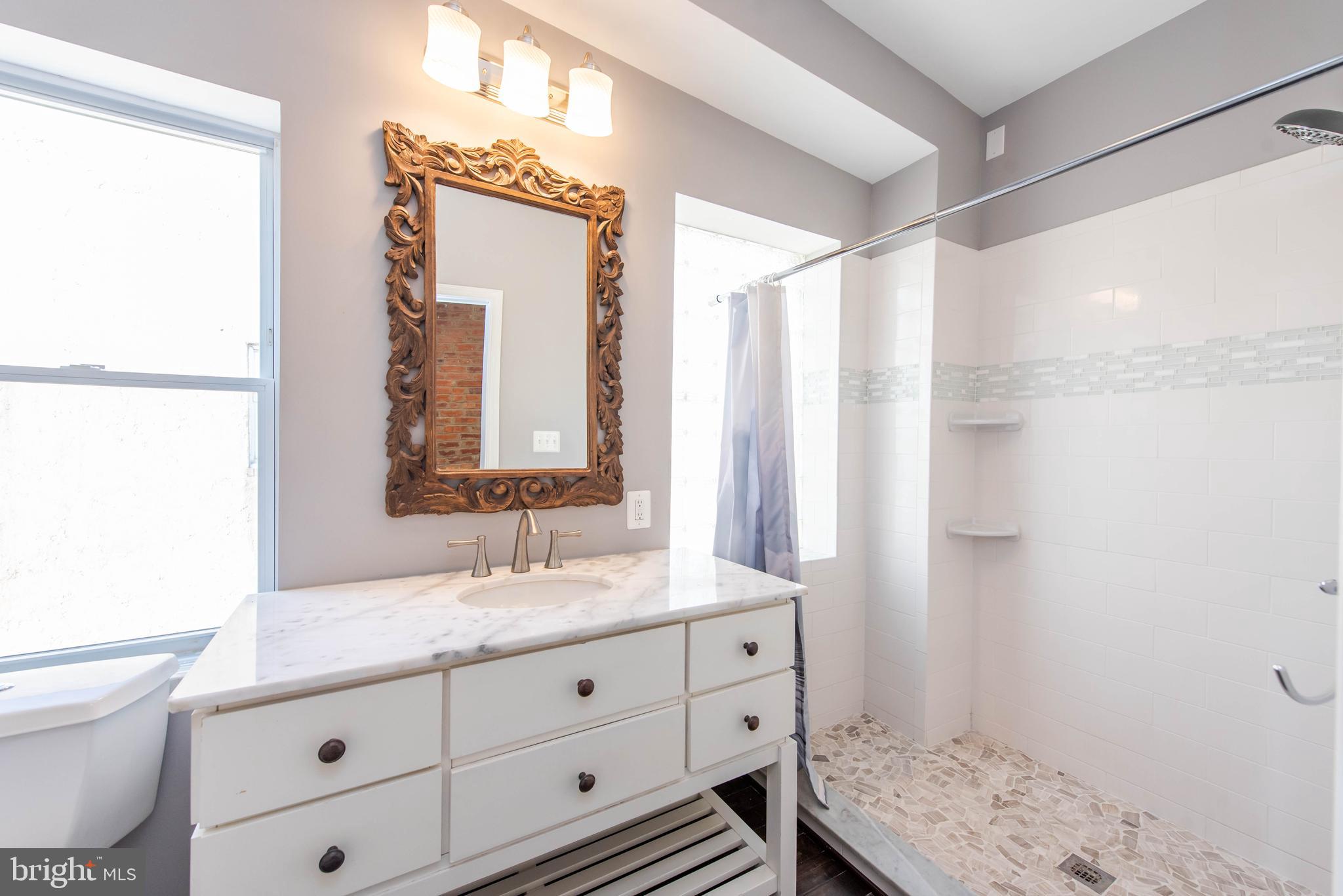 756 Ramsay Street Baltimore, MD 21230 - Photo 19 of 40 Upper Level / Full Spa Bath