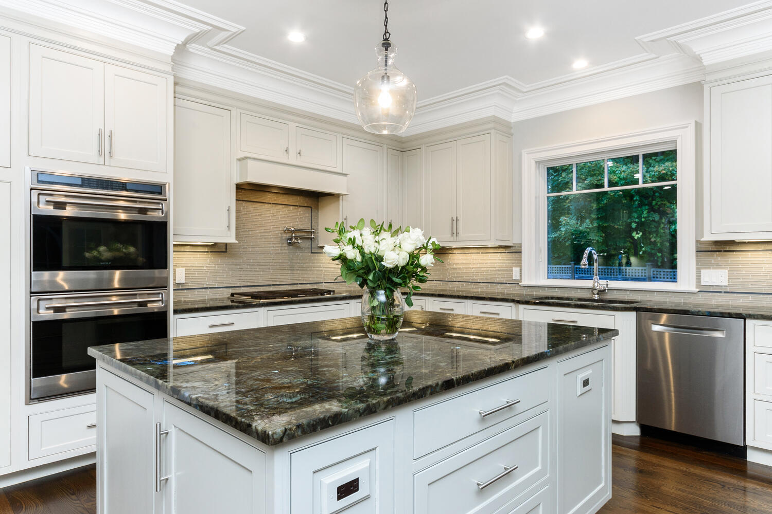 178 Middlesex Road Darien, CT 06820 - Photo 14 of 44 a kitchen with stainless steel appliances granite countertop a sink and a microwave