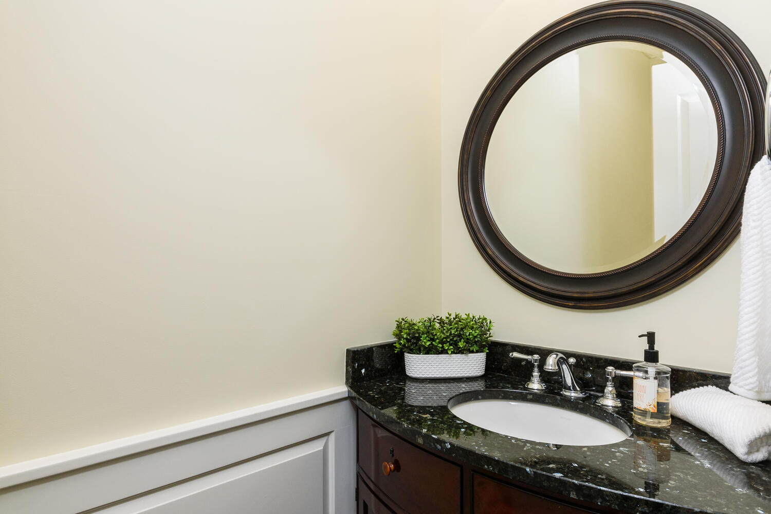 178 Middlesex Road Darien, CT 06820 - Photo 19 of 44 a bathroom with a sink and a mirror