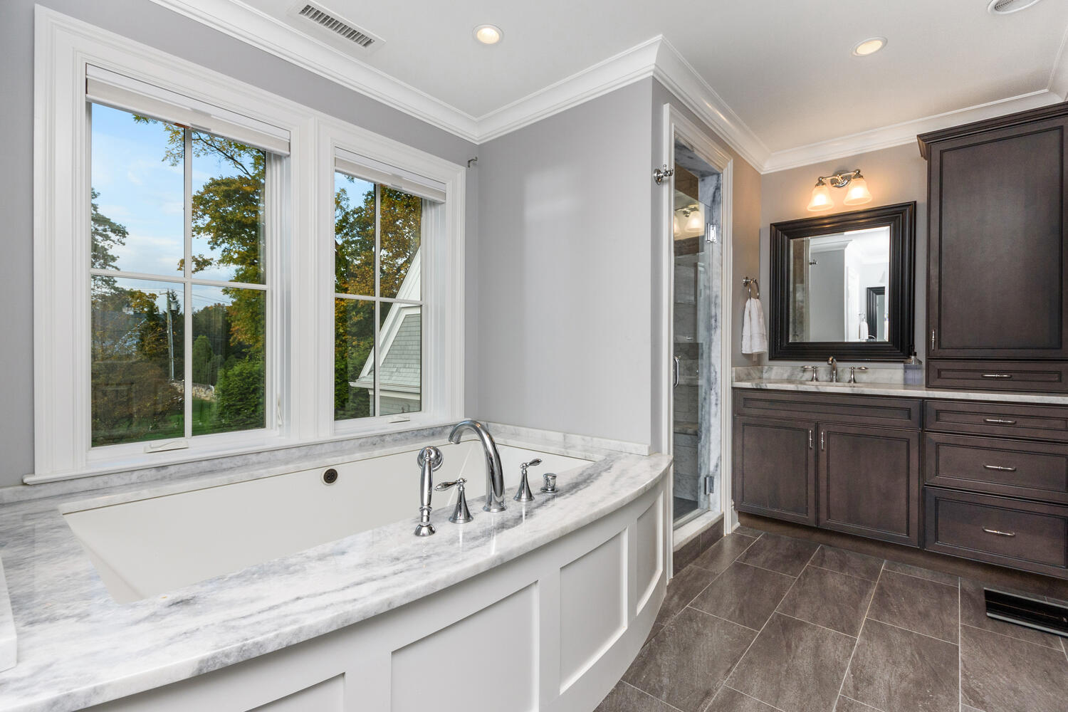 178 Middlesex Road Darien, CT 06820 - Photo 23 of 44 a bathroom with a granite countertop sink and a bathtub