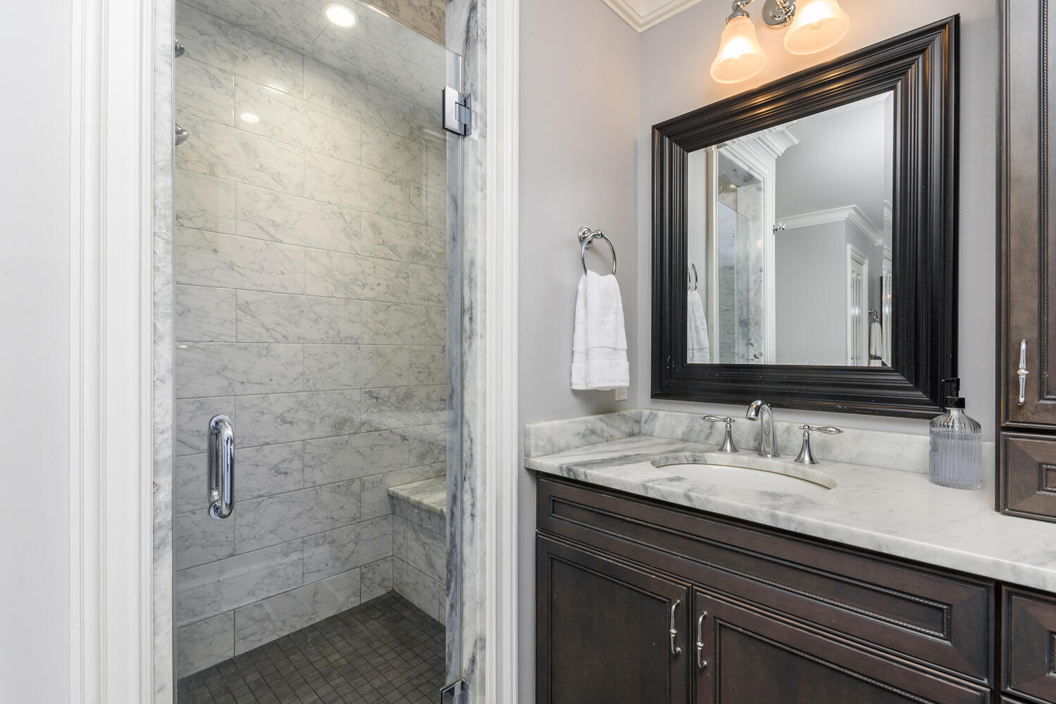 178 Middlesex Road Darien, CT 06820 - Photo 24 of 44 a bathroom with a granite countertop sink a mirror and a shower