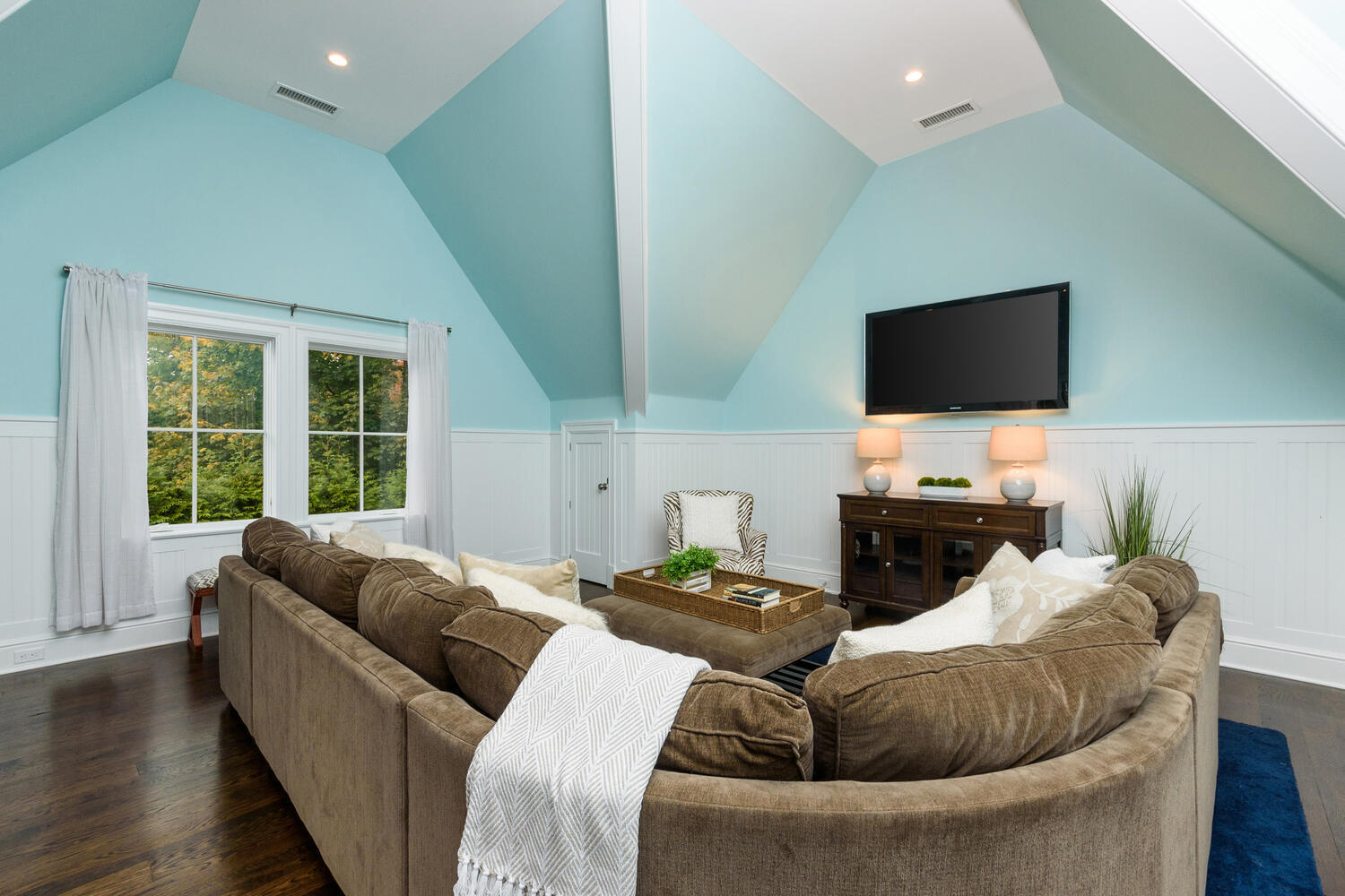 178 Middlesex Road Darien, CT 06820 - Photo 28 of 44 a living room with furniture and a flat screen tv