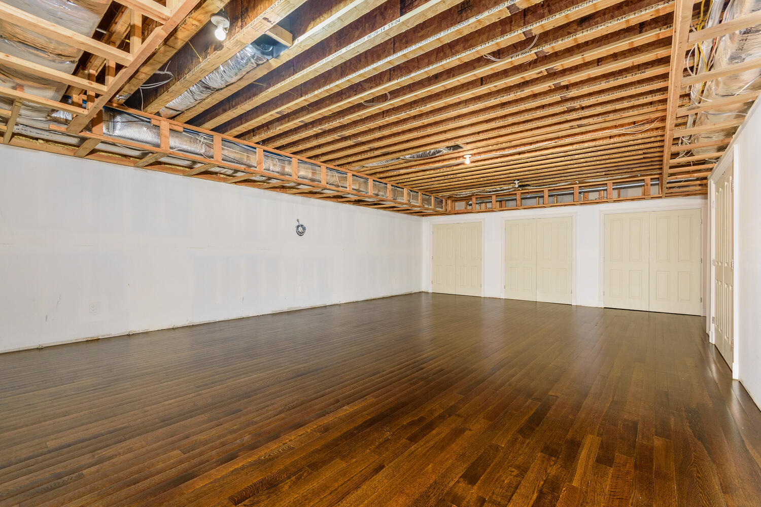 178 Middlesex Road Darien, CT 06820 - Photo 37 of 44 a view of a room with wooden floor