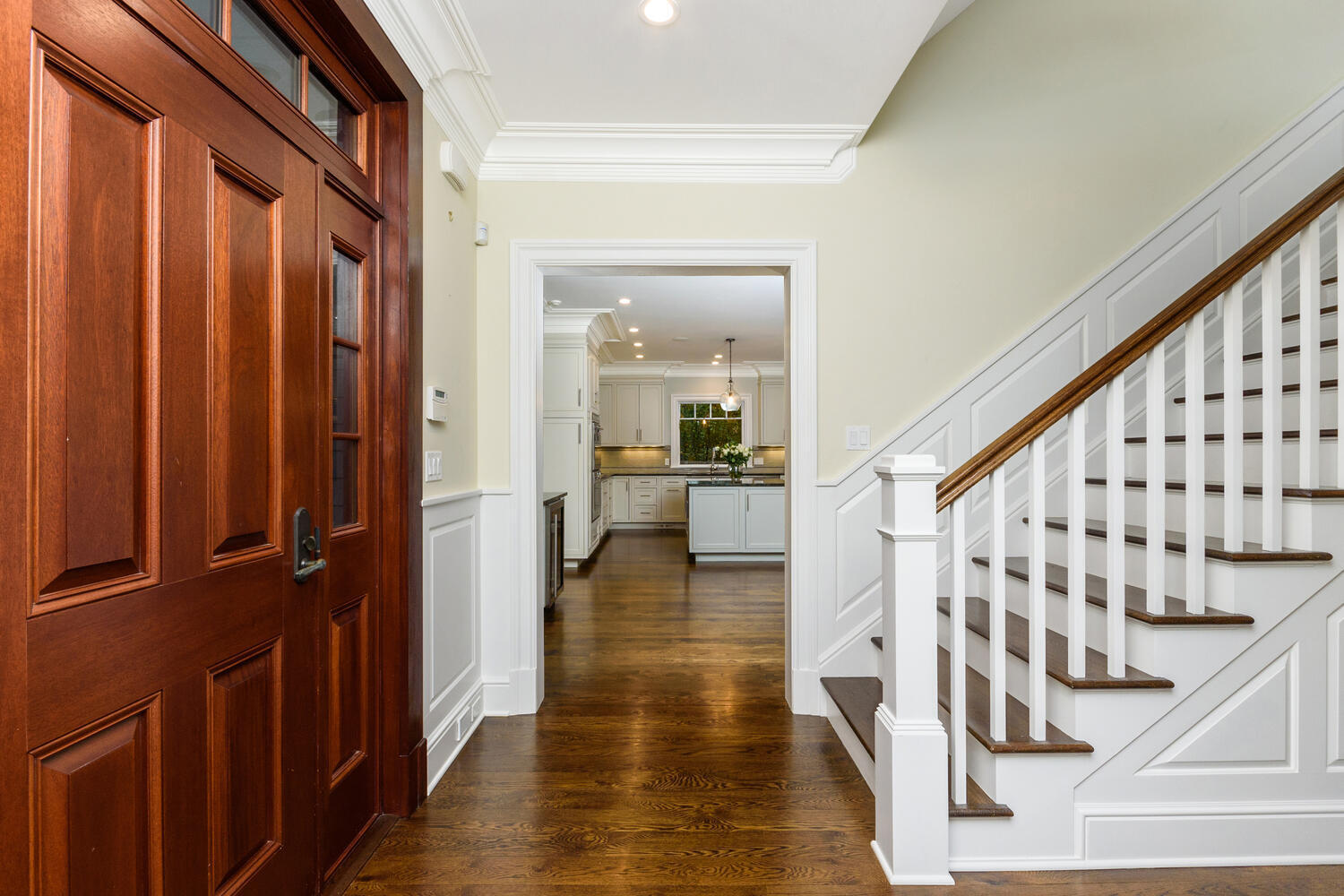 178 Middlesex Road Darien, CT 06820 - Photo 5 of 44 a view of a hallway with wooden floor and staircase