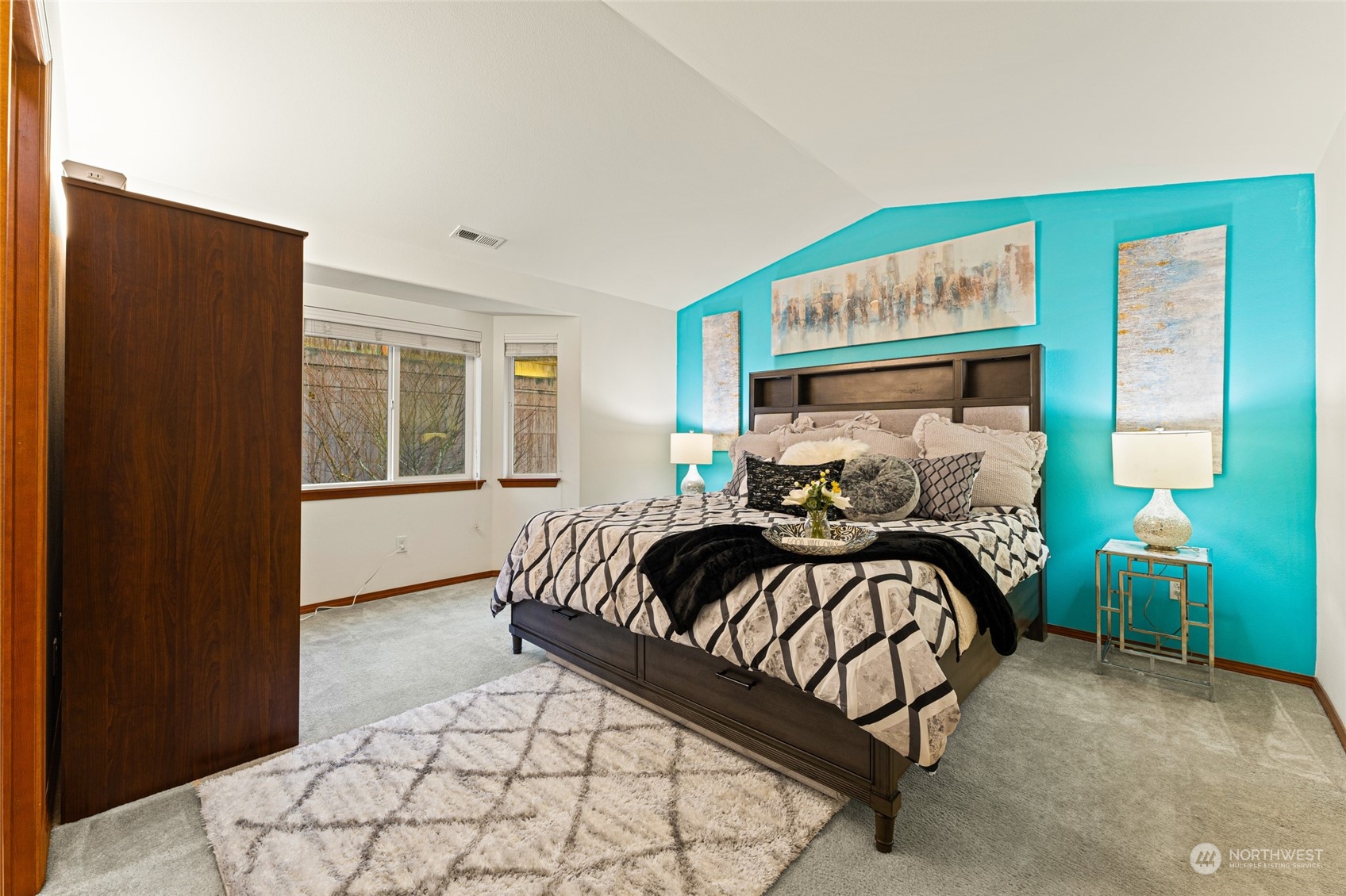 22907 41st Drive Southeast Bothell, WA 98021 - Photo 29 of 39 a bedroom with a bed and wooden floor