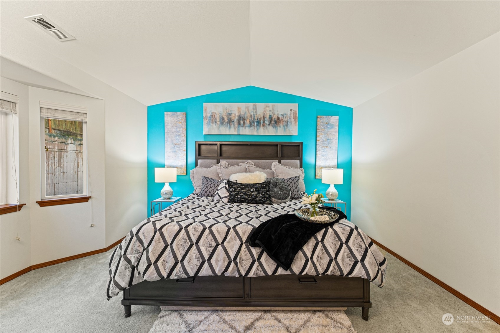 22907 41st Drive Southeast Bothell, WA 98021 - Photo 30 of 39 a bedroom with a bed a window and lamp
