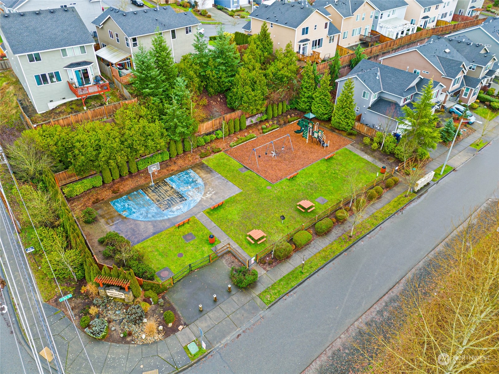 22907 41st Drive Southeast Bothell, WA 98021 - Photo 39 of 39 an aerial view of a pool patio chairs and fire pit