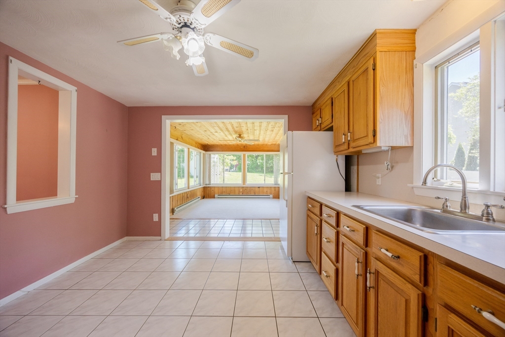 4 Cypress Road Natick, MA 01760 - Photo 12 of 32 a large kitchen with a large window