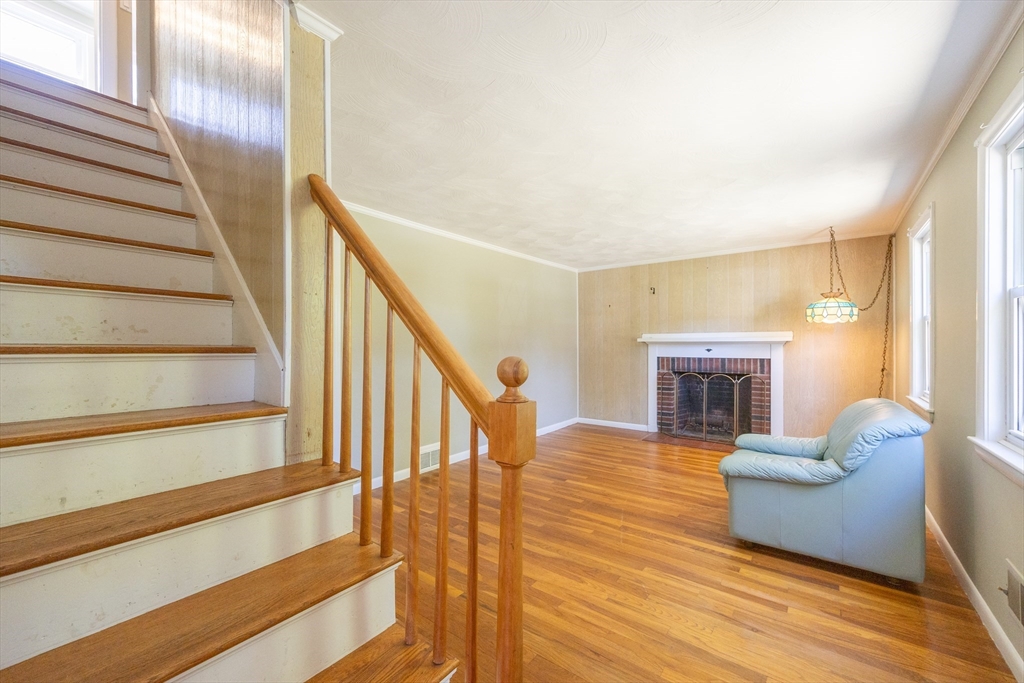 4 Cypress Road Natick, MA 01760 - Photo 23 of 32 a view of living room with furniture and fireplace
