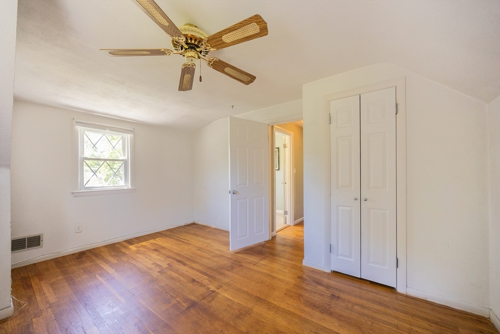 4 Cypress Road Natick, MA 01760 - Photo 29 of 32 wooden floor in an empty room with a window