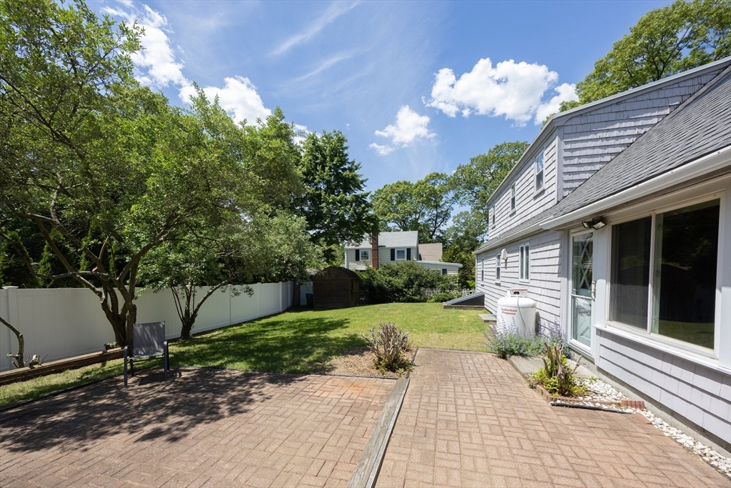 4 Cypress Road Natick, MA 01760 - Photo 8 of 32 a view of a porch with a yard