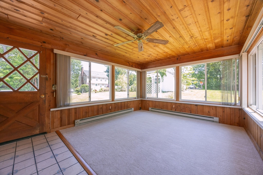 4 Cypress Road Natick, MA 01760 - Photo 10 of 32 a view of an empty room with a window