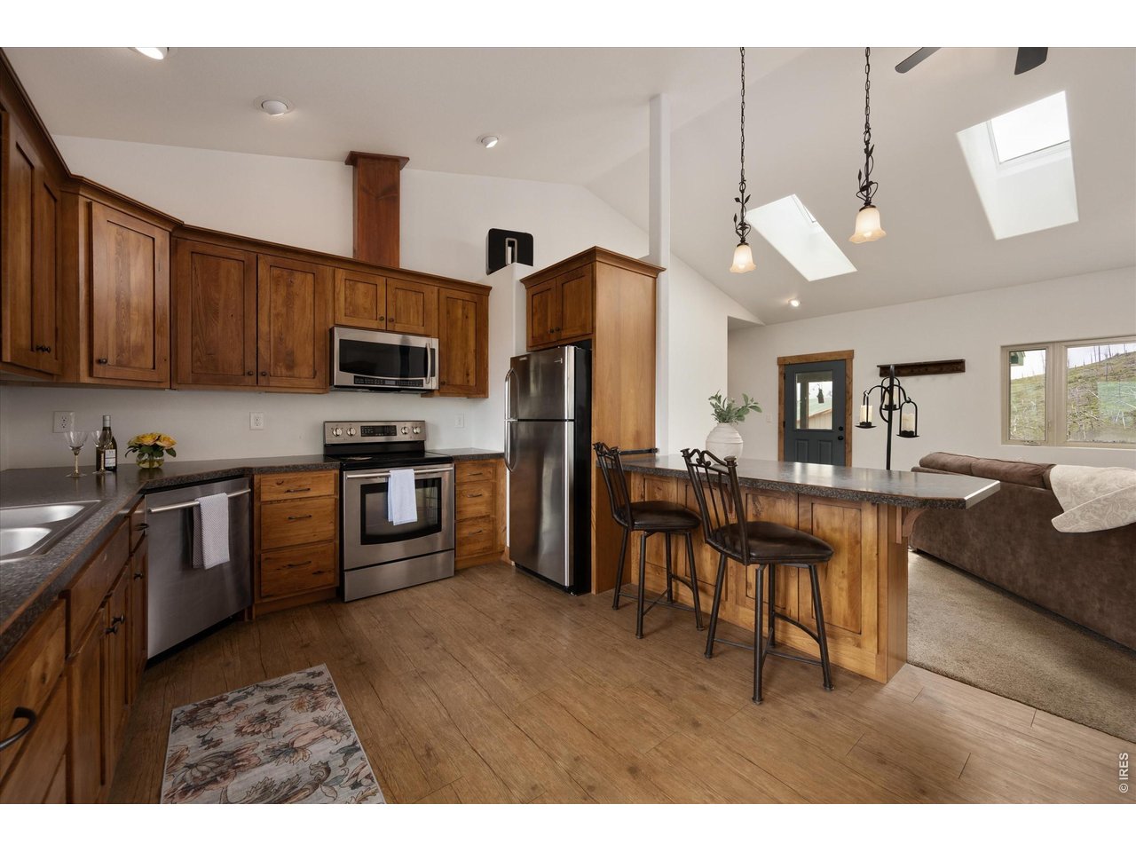 1291 Little Whale Road Bellvue, CO 80512 - Photo 14 of 43 The alder custom cabinets are waiting for you