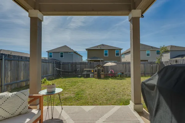 a view of swimming pool with patio