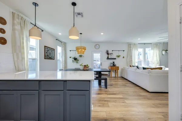 a view of a kitchen and dining room