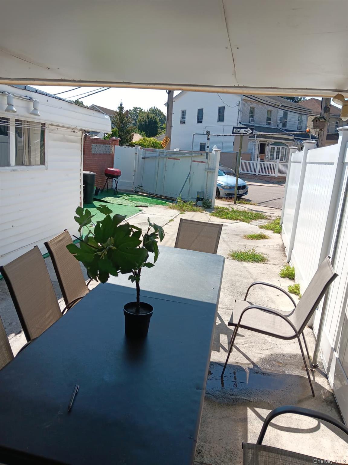 91-08 Sutter Avenue Queens, NY 11417 - Photo 24 of 32 View of patio featuring outdoor dining space and grilling area