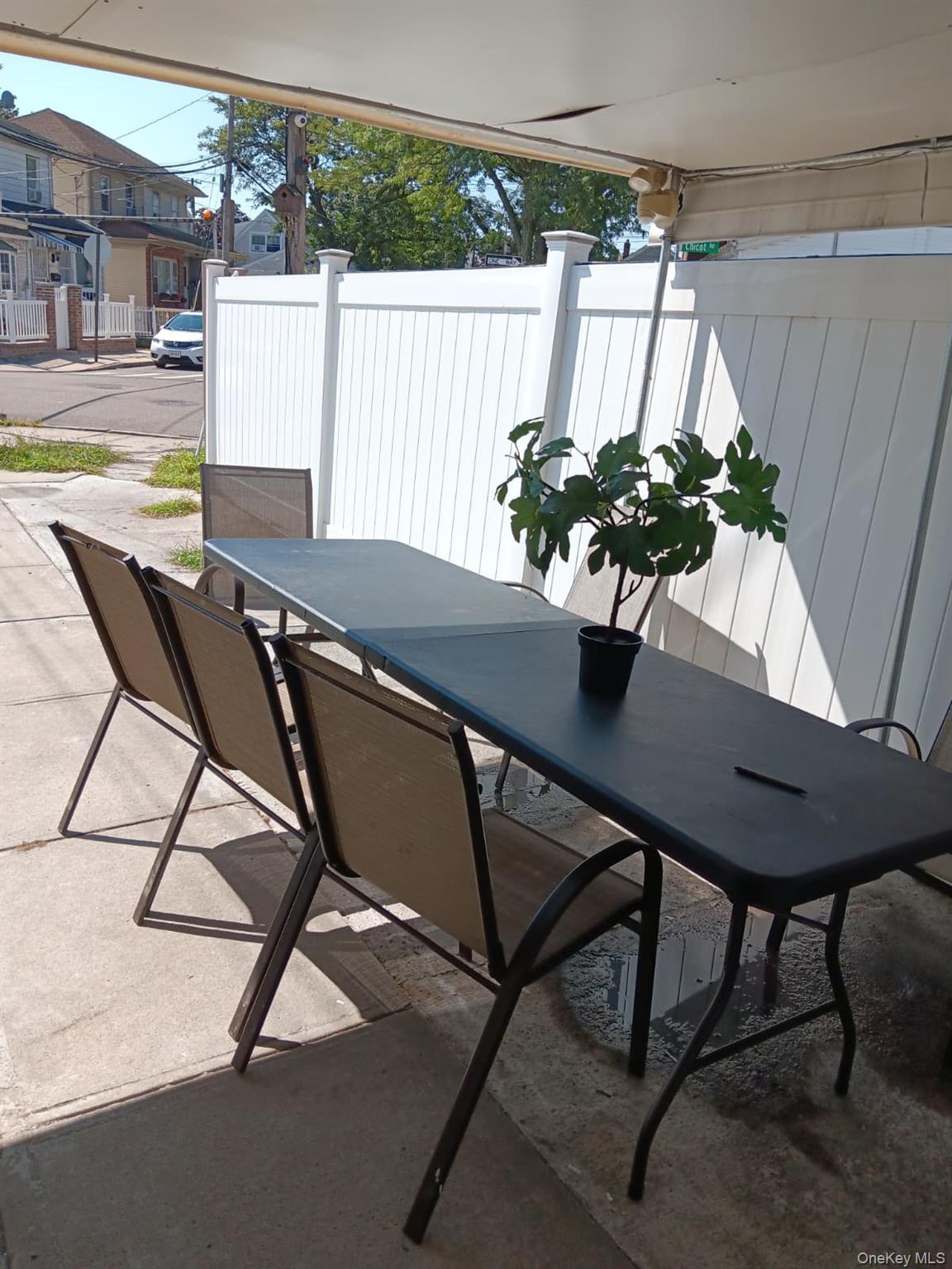 91-08 Sutter Avenue Queens, NY 11417 - Photo 26 of 32 View of patio / terrace with outdoor dining space