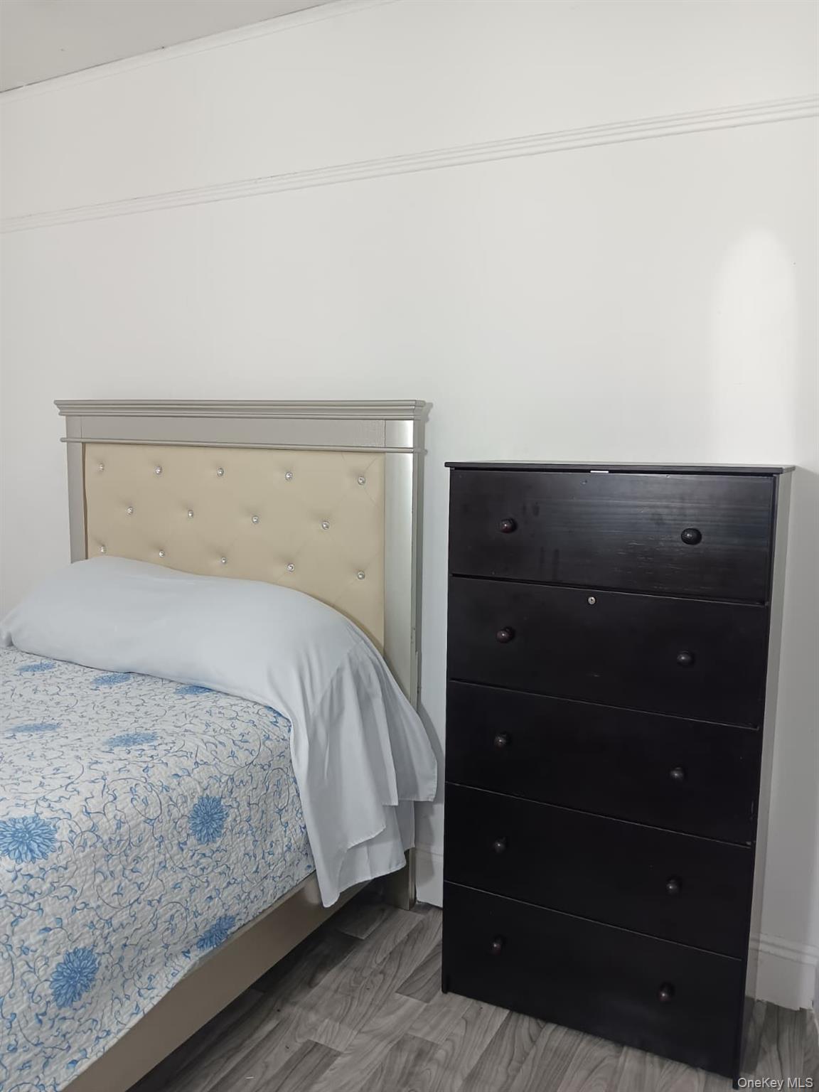 91-08 Sutter Avenue Queens, NY 11417 - Photo 32 of 32 Bedroom with wood finished floors