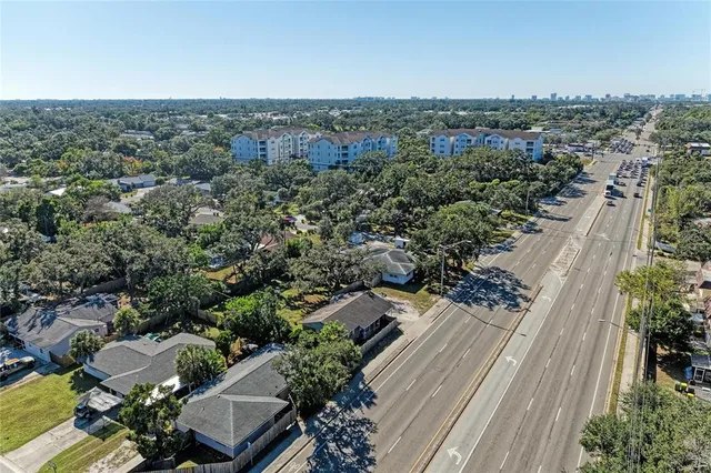 an aerial view of a city with lots of residential buildings