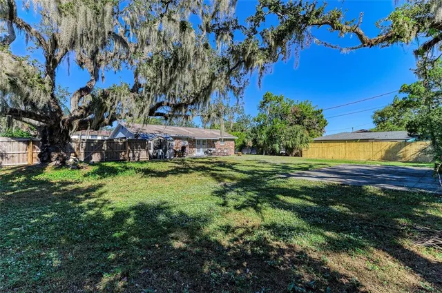 a view of a house with a garden