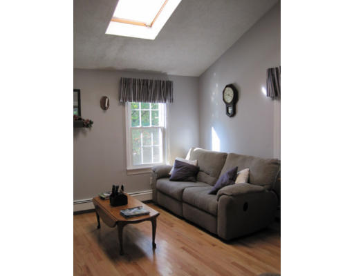 20 Pinewood Road Chelmsford, MA 01824 - Photo 2 of 15 a living room with furniture and a window