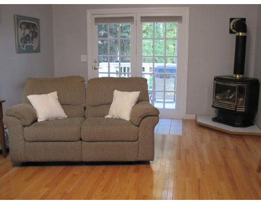 20 Pinewood Road Chelmsford, MA 01824 - Photo 3 of 15 a living room with furniture and a flat screen tv