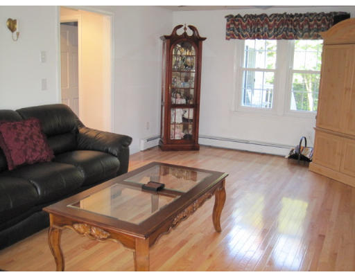 20 Pinewood Road Chelmsford, MA 01824 - Photo 6 of 15 a living room with furniture and window