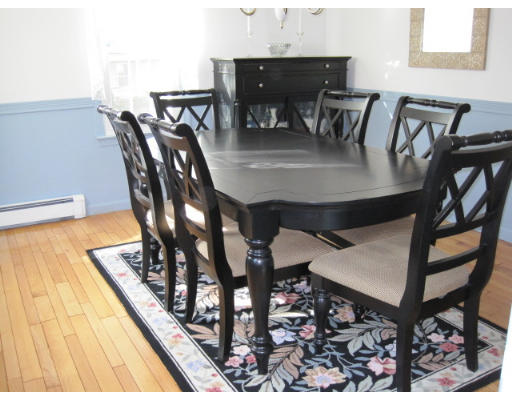 20 Pinewood Road Chelmsford, MA 01824 - Photo 8 of 15 a dining room with furniture and wooden floor