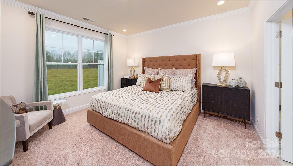 7870 Iron Road Sherrills Ford, NC 28673 - Photo 13 of 39 a bedroom with a bed and wooden floor