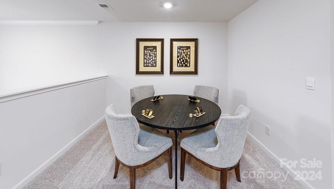 7870 Iron Road Sherrills Ford, NC 28673 - Photo 20 of 39 a view of a room with a table and chairs