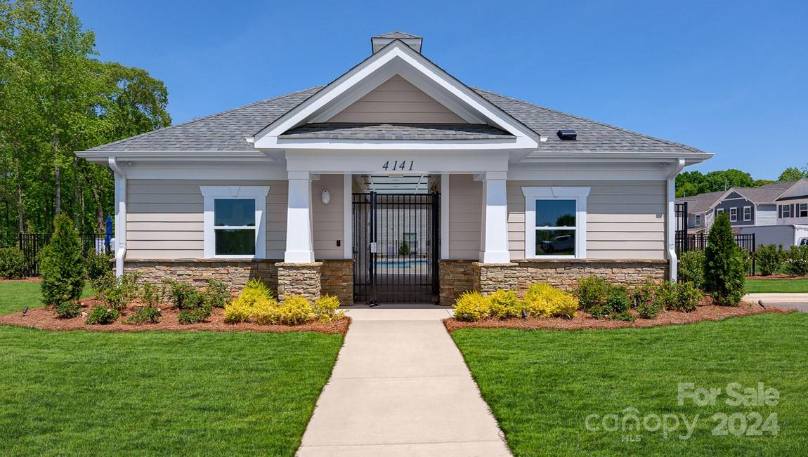 7870 Iron Road Sherrills Ford, NC 28673 - Photo 32 of 39 a front view of a house with garden