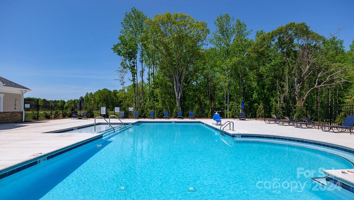 7870 Iron Road Sherrills Ford, NC 28673 - Photo 34 of 39 a view of a swimming pool with lounge chair