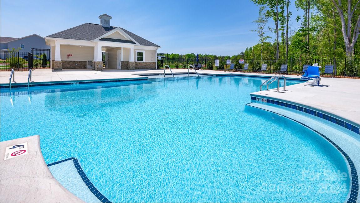 7870 Iron Road Sherrills Ford, NC 28673 - Photo 35 of 39 a front view of a house with swimming pool having outdoor seating
