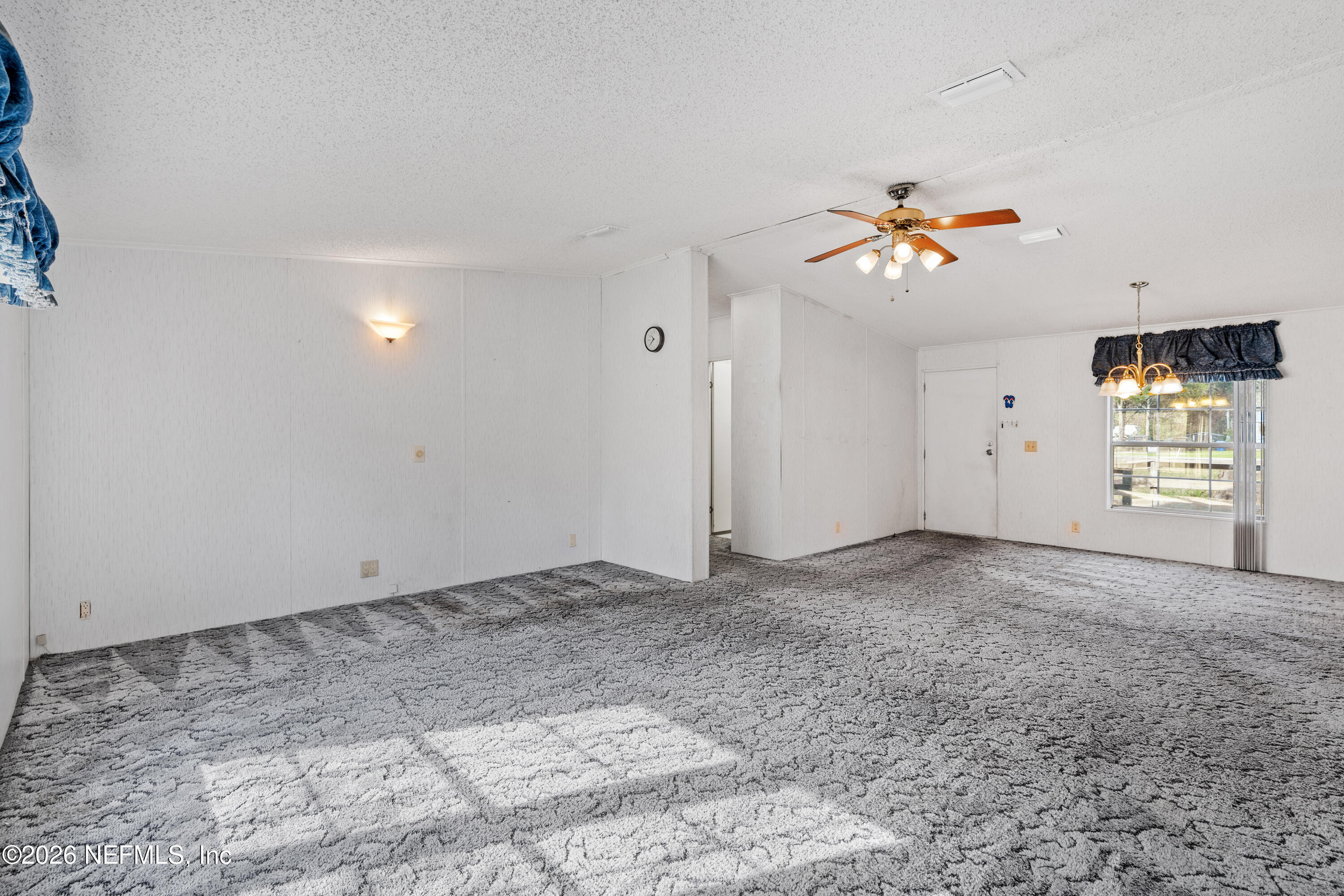 75026 Semper Fi Drive Yulee, FL 32097 - Photo 15 of 43 a view of an empty room with a window