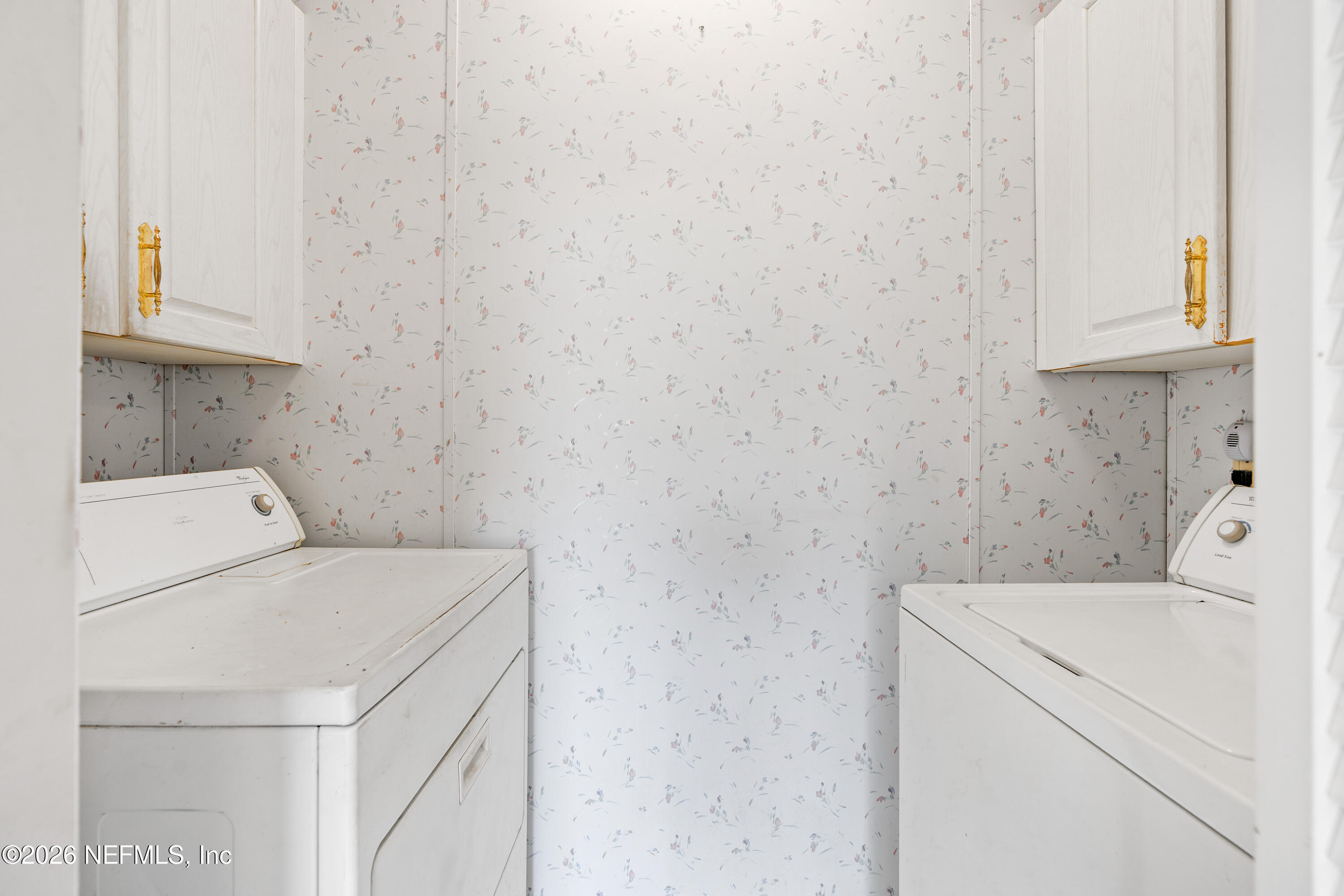 75026 Semper Fi Drive Yulee, FL 32097 - Photo 17 of 43 a utility room with dryer and washer