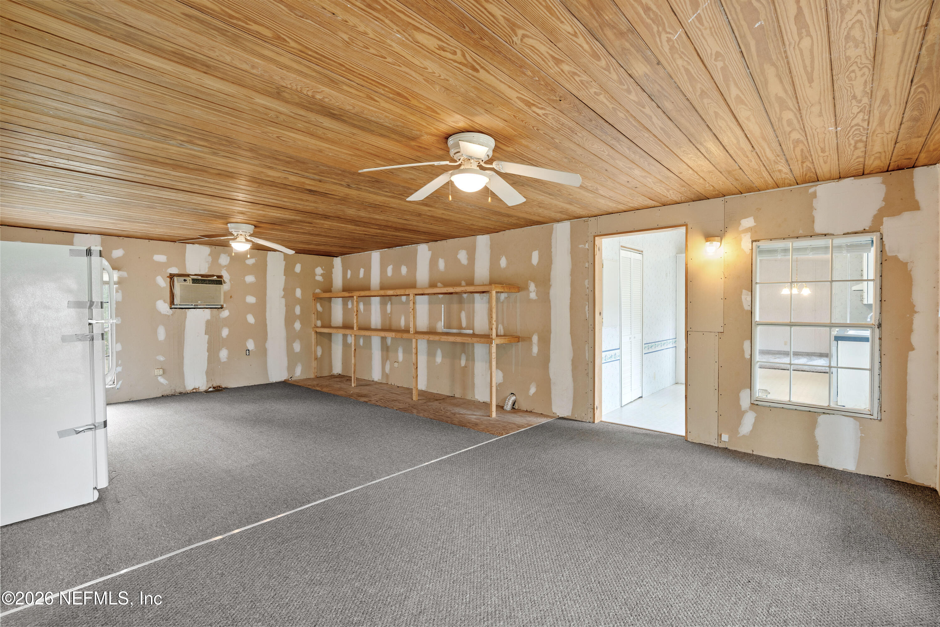 75026 Semper Fi Drive Yulee, FL 32097 - Photo 19 of 43 a view of an empty room with a window