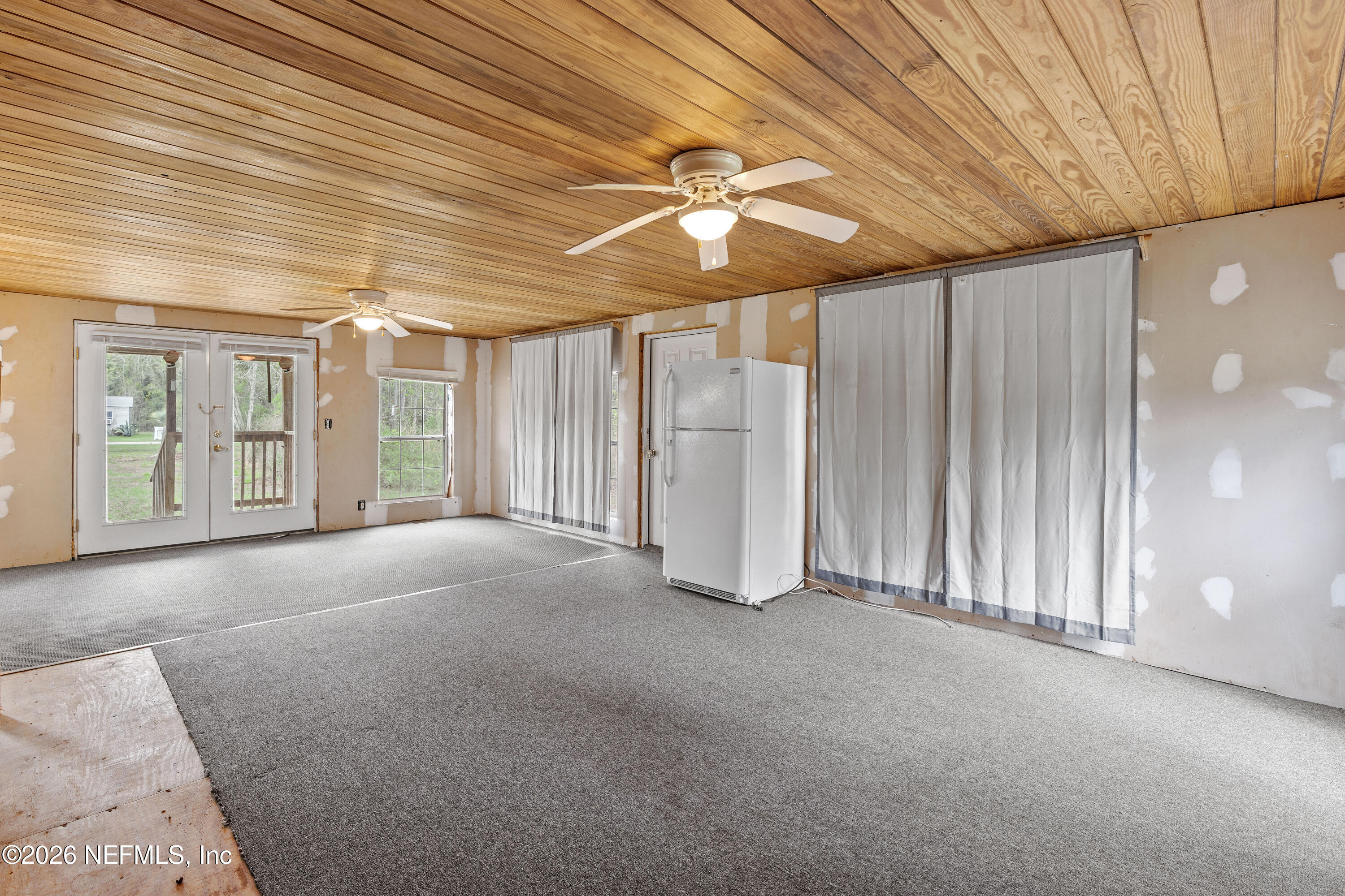 75026 Semper Fi Drive Yulee, FL 32097 - Photo 20 of 43 a view of an empty room with a window