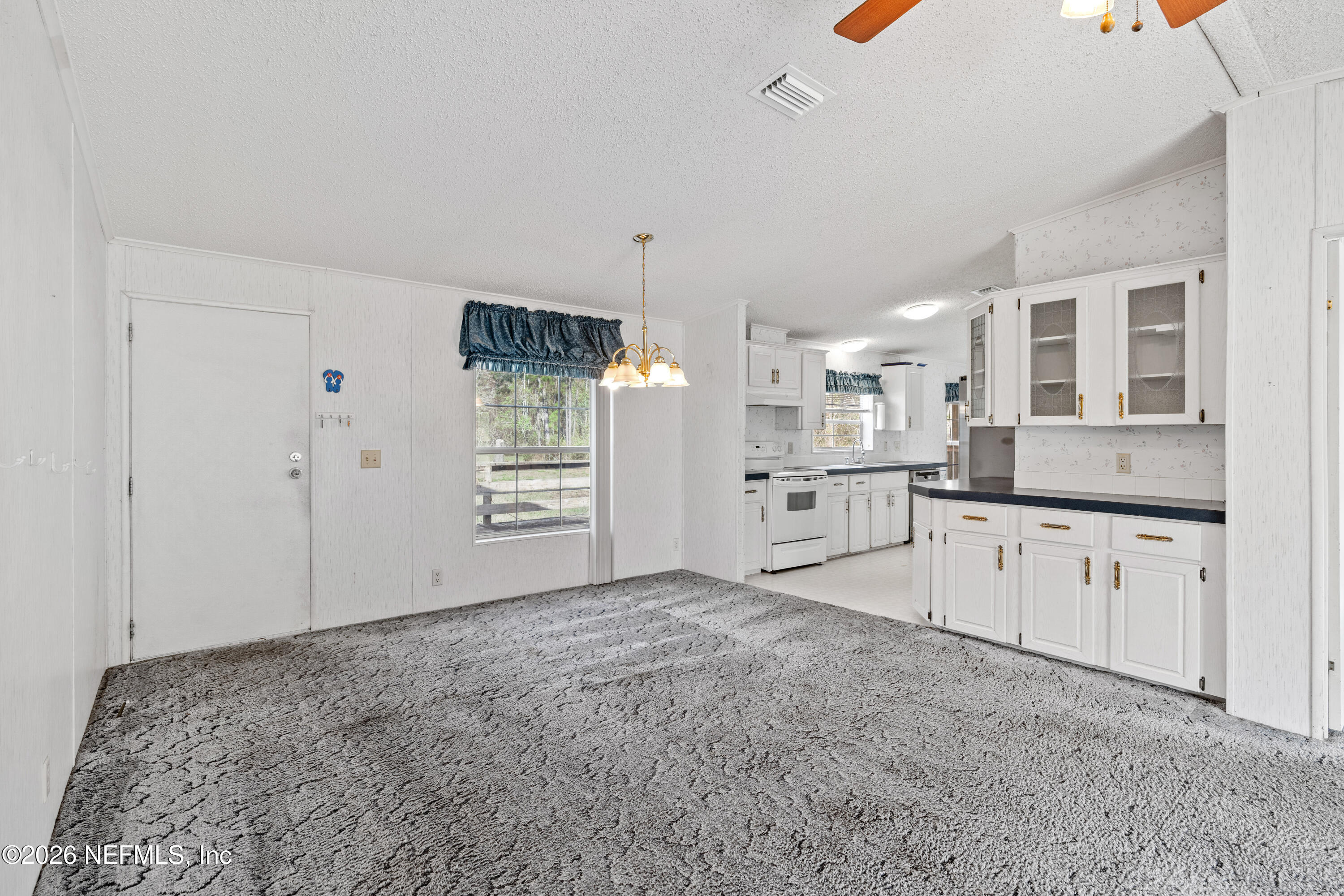 75026 Semper Fi Drive Yulee, FL 32097 - Photo 6 of 43 a view of a kitchen with a sink