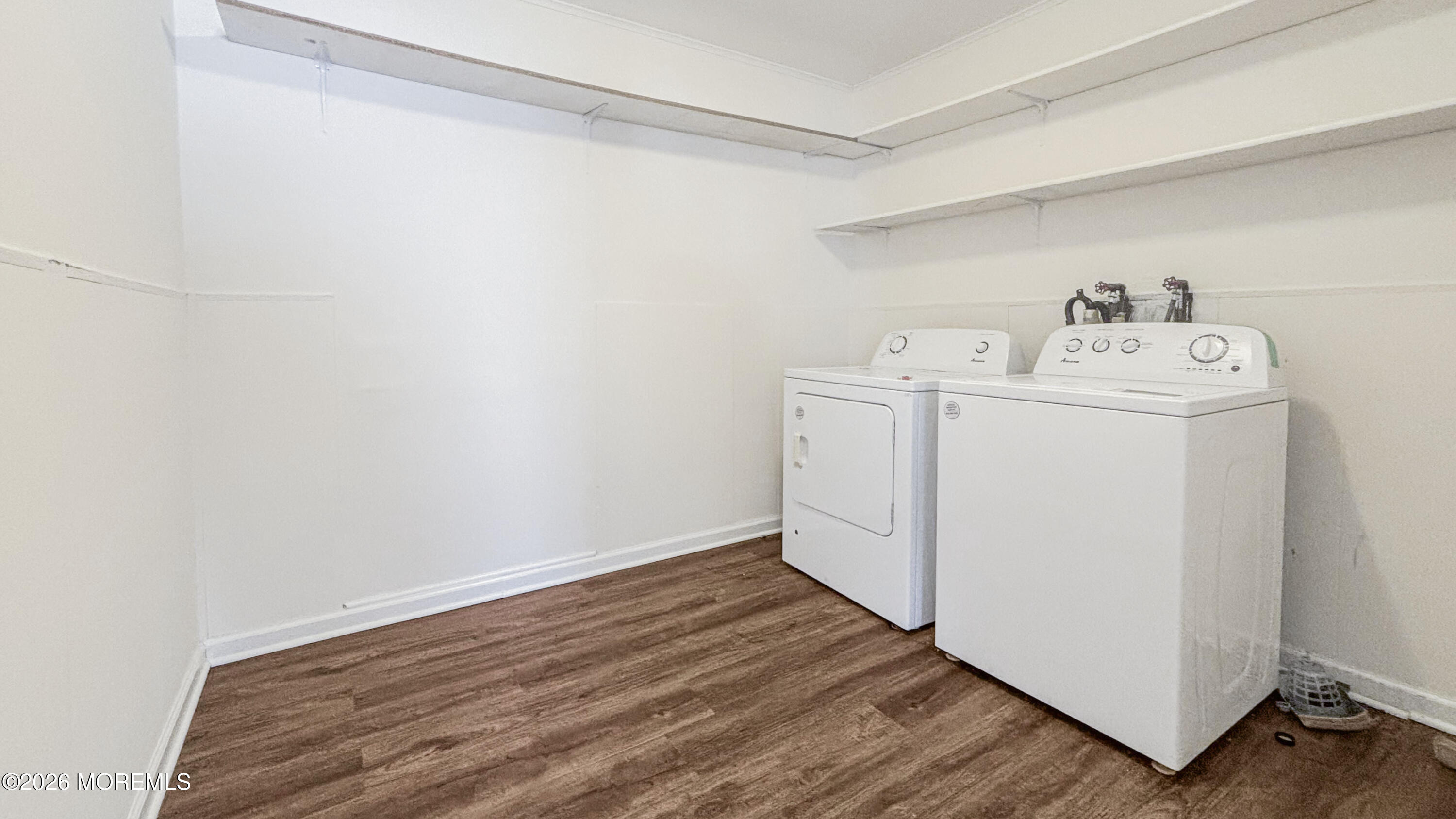 385 Delaware Drive Brick, NJ 08723 - Photo 11 of 16 a utility room with wooden floor washer and dryer