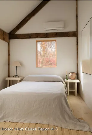 a view of a patio with table and chairs and potted plants